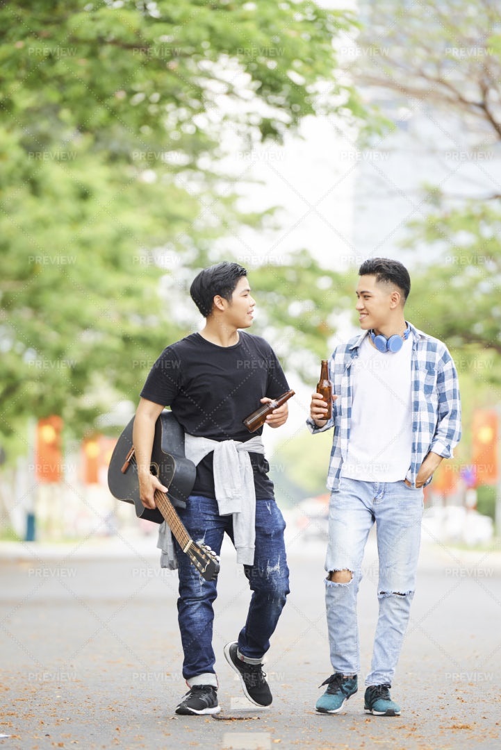 Teenagers Walking In The Park: Stock Photos