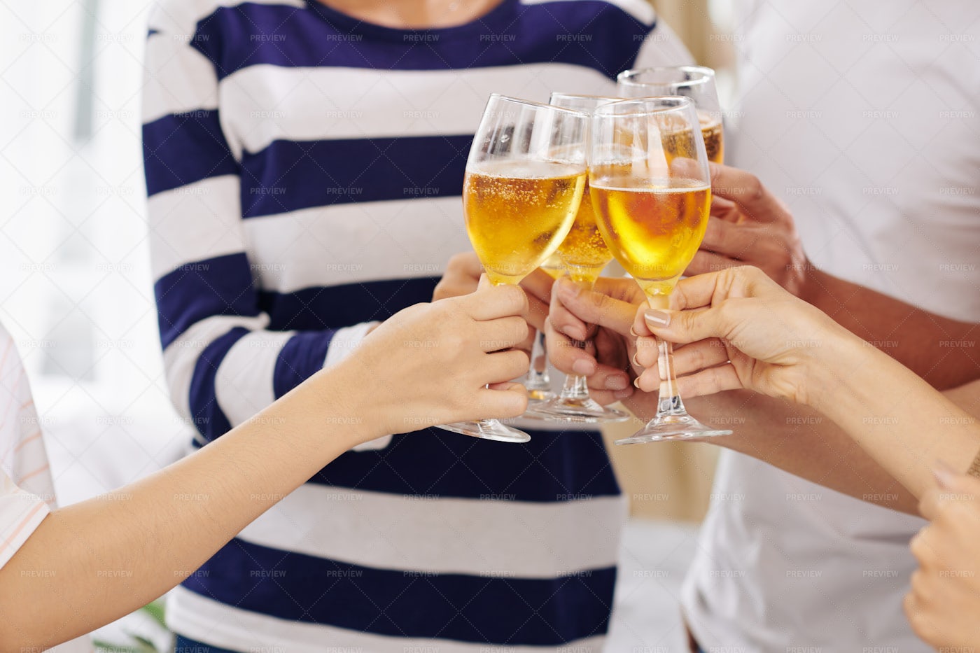 People Toasting With Champagne Glasses: Stock Photos