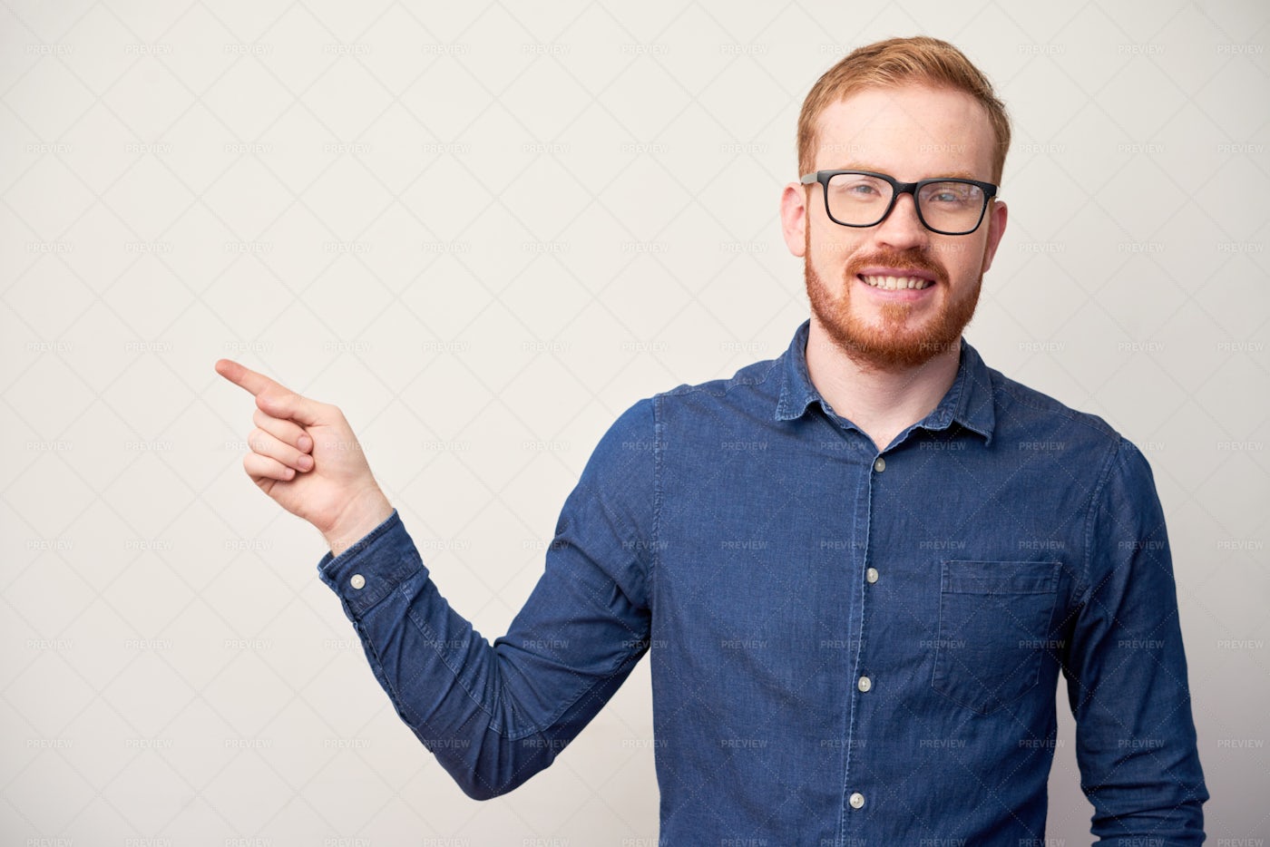 Happy Man Pointing With Finger: Stock Photos