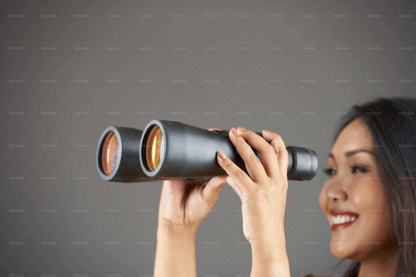 Woman Spying Through Binoculars: Stock Photos