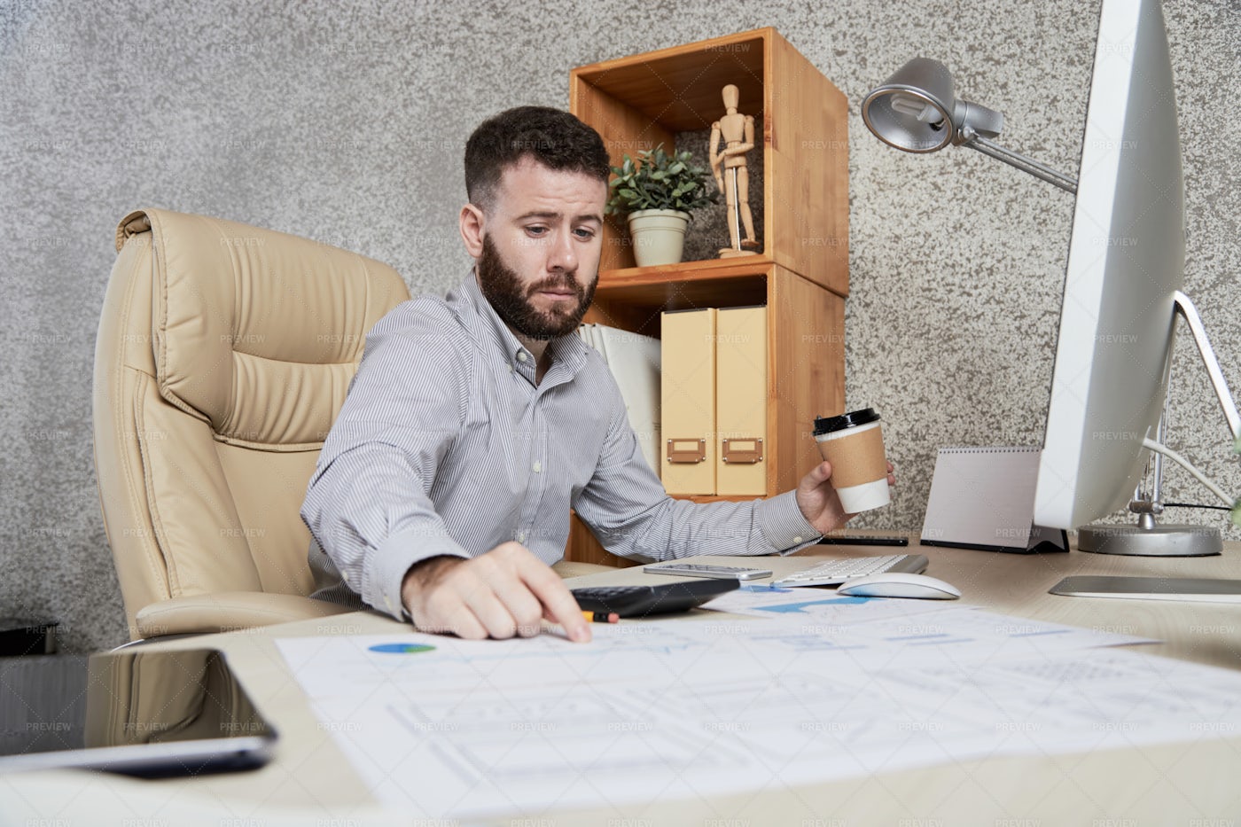 Businessman Working With Documents At: Stock Photos