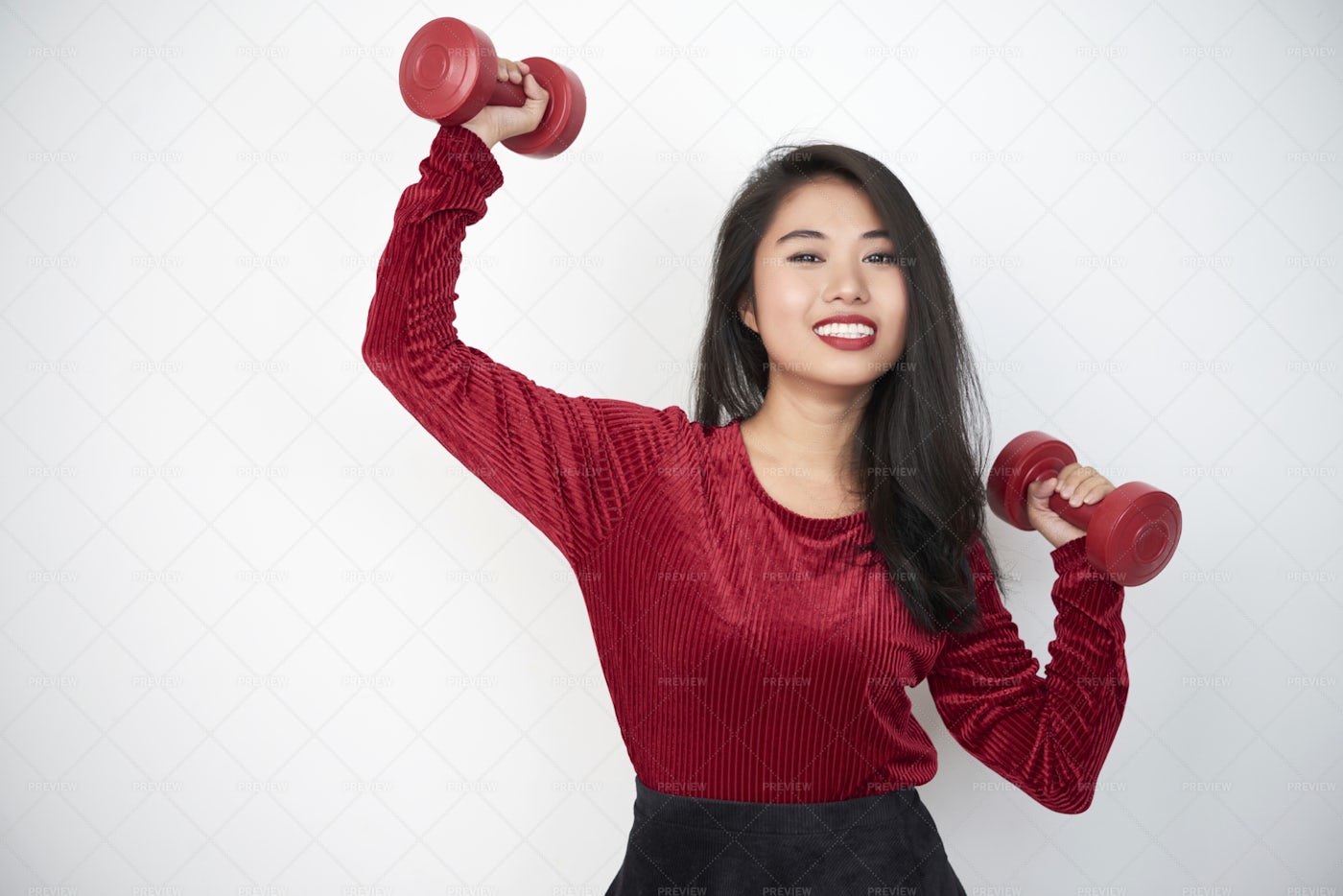 Woman Exercising With Dumbbells: Stock Photos