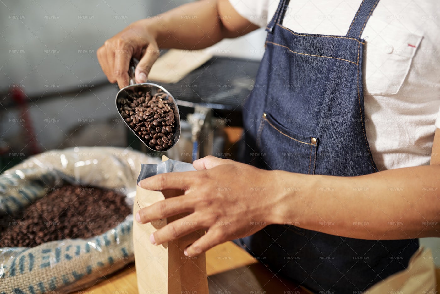 Packing Coffee Beans In Bag: Stock Photos