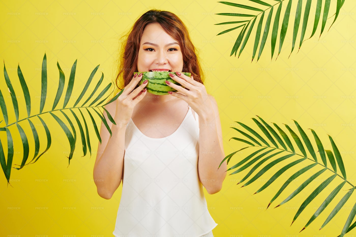 Woman Eating Watermelon: Stock Photos