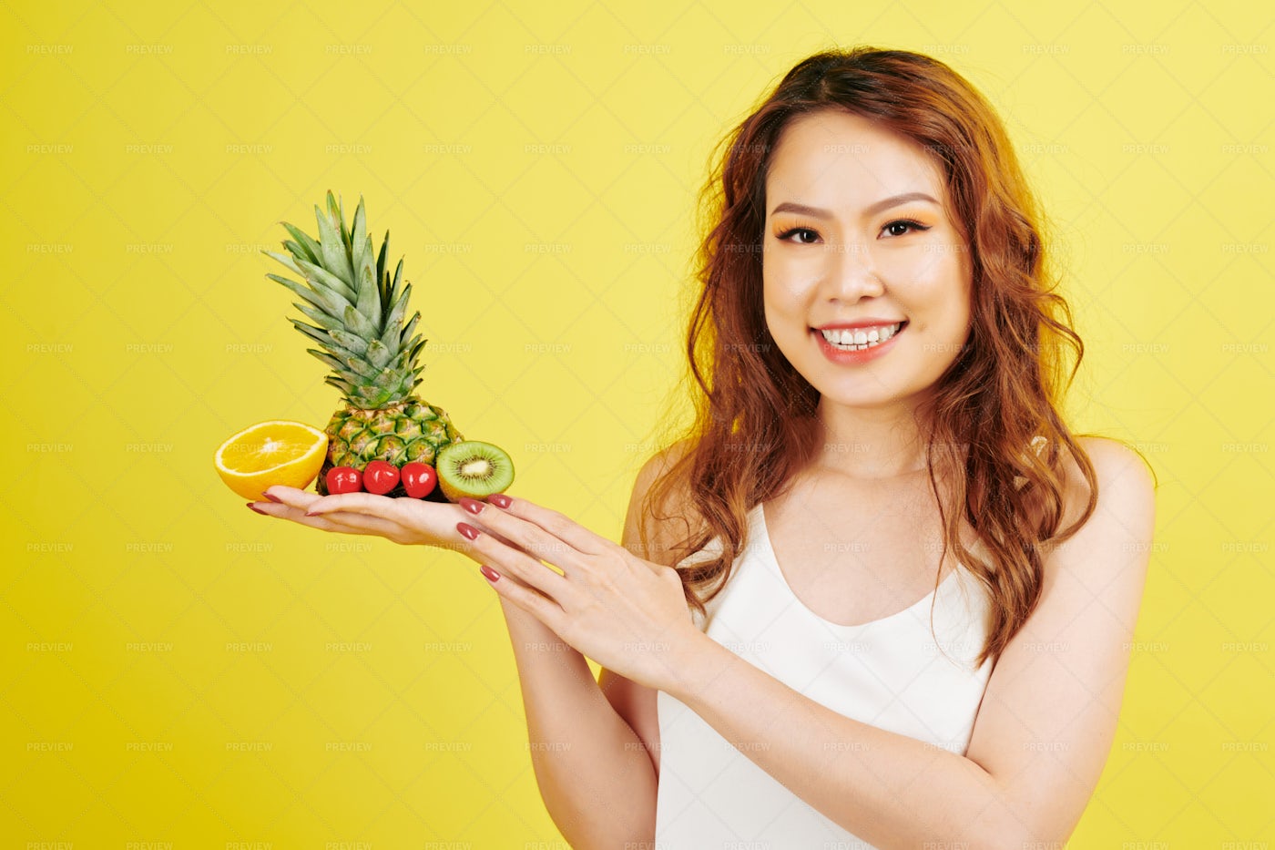 Woman With Tropical Fruits: Stock Photos