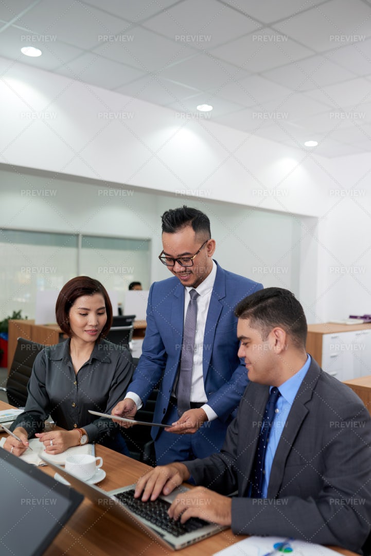 Business People Working In Team At: Stock Photos