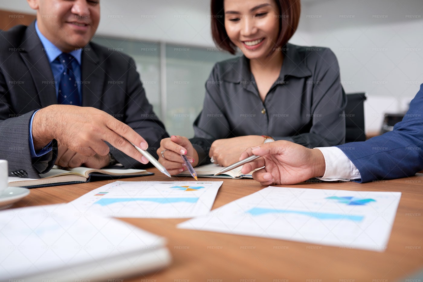 Business People Analyzing Financial: Stock Photos
