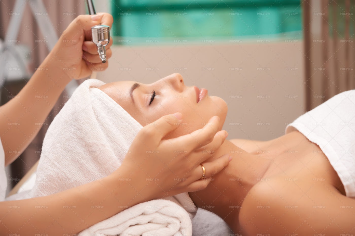 Woman Doing Rejuvenating Treatment: Stock Photos