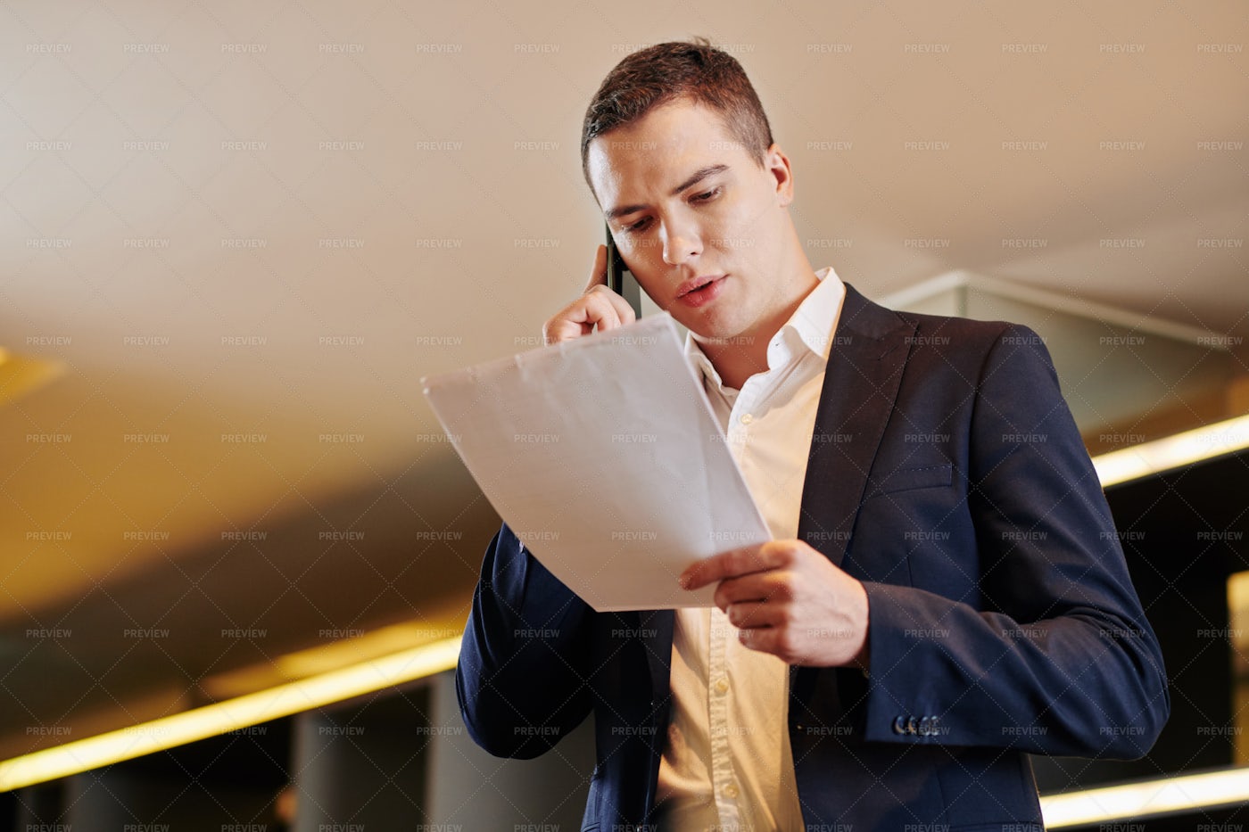 Businessman Calling On Phone: Stock Photos