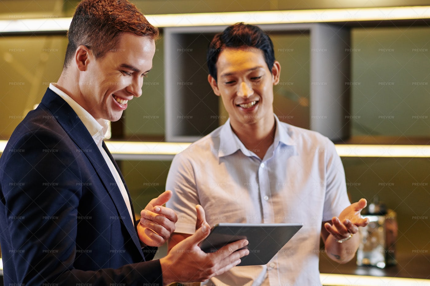 Coworkers Discussing Mobile App: Stock Photos