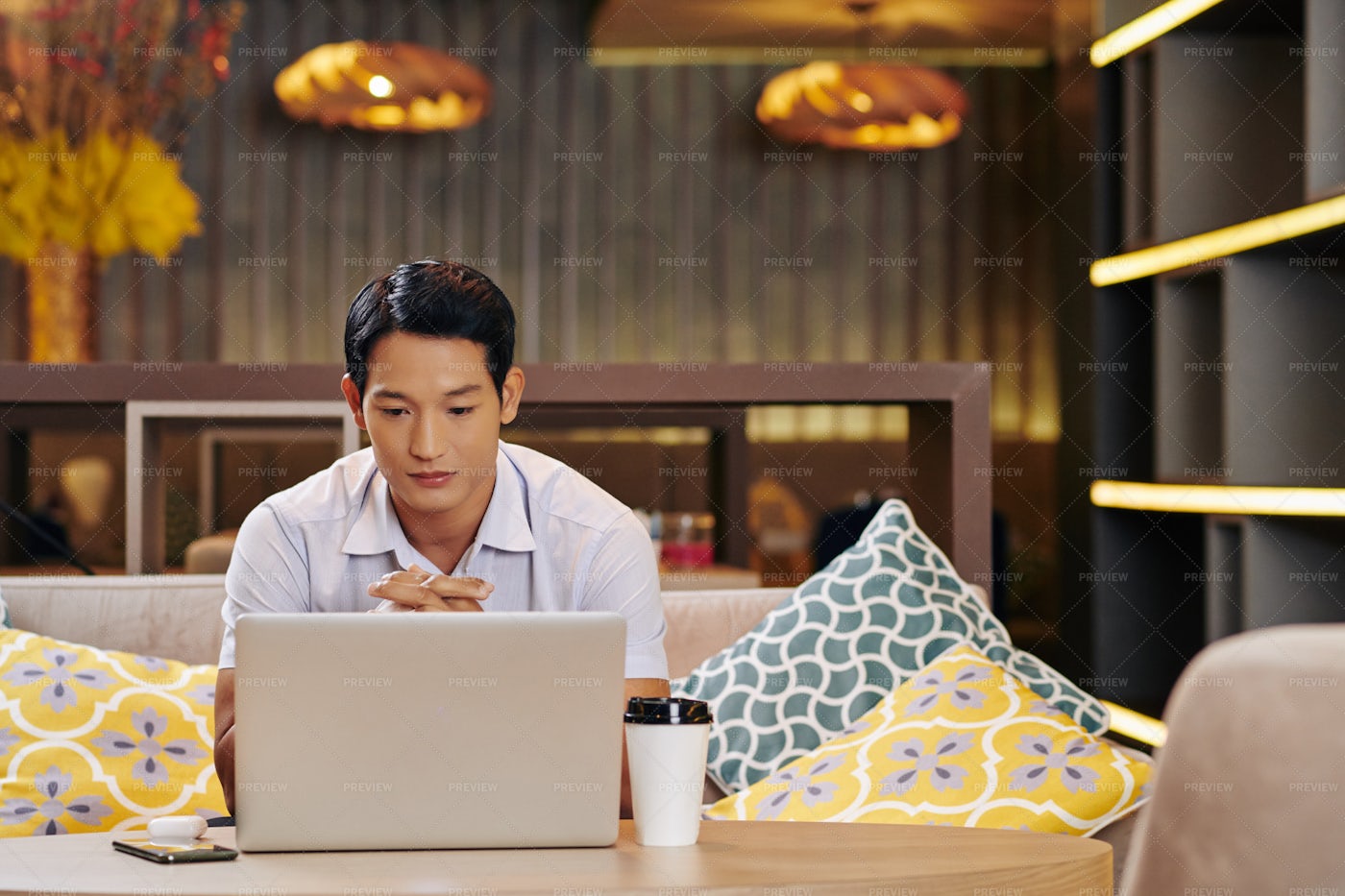 Pensive Businessman With Opened Laptop: Stock Photos