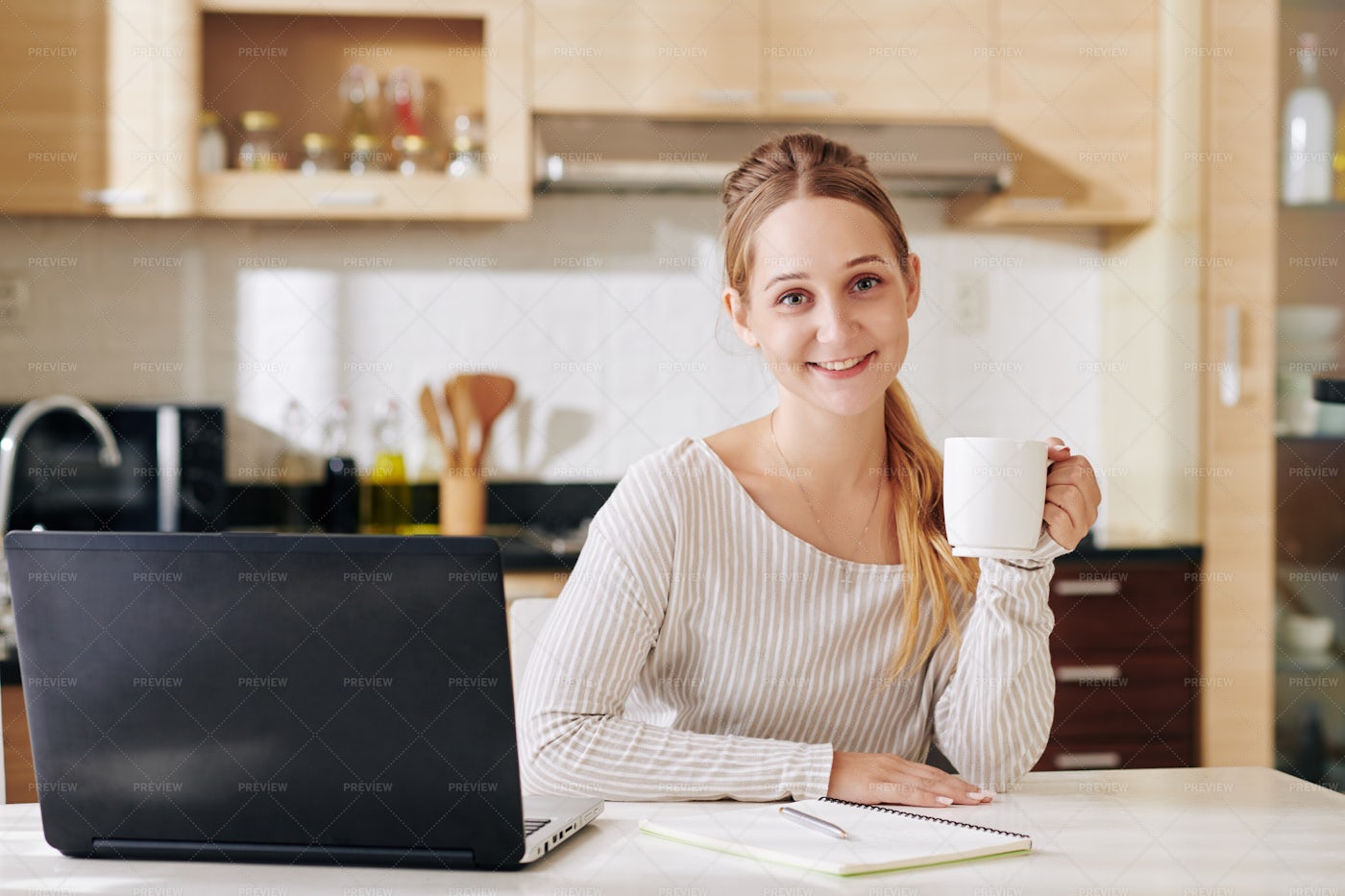 Pretty Woman At Kitchen Table: Stock Photos