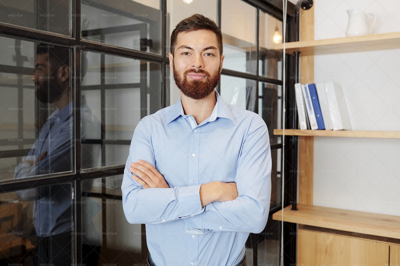 Young Manager Standing At Office: Stock Photos