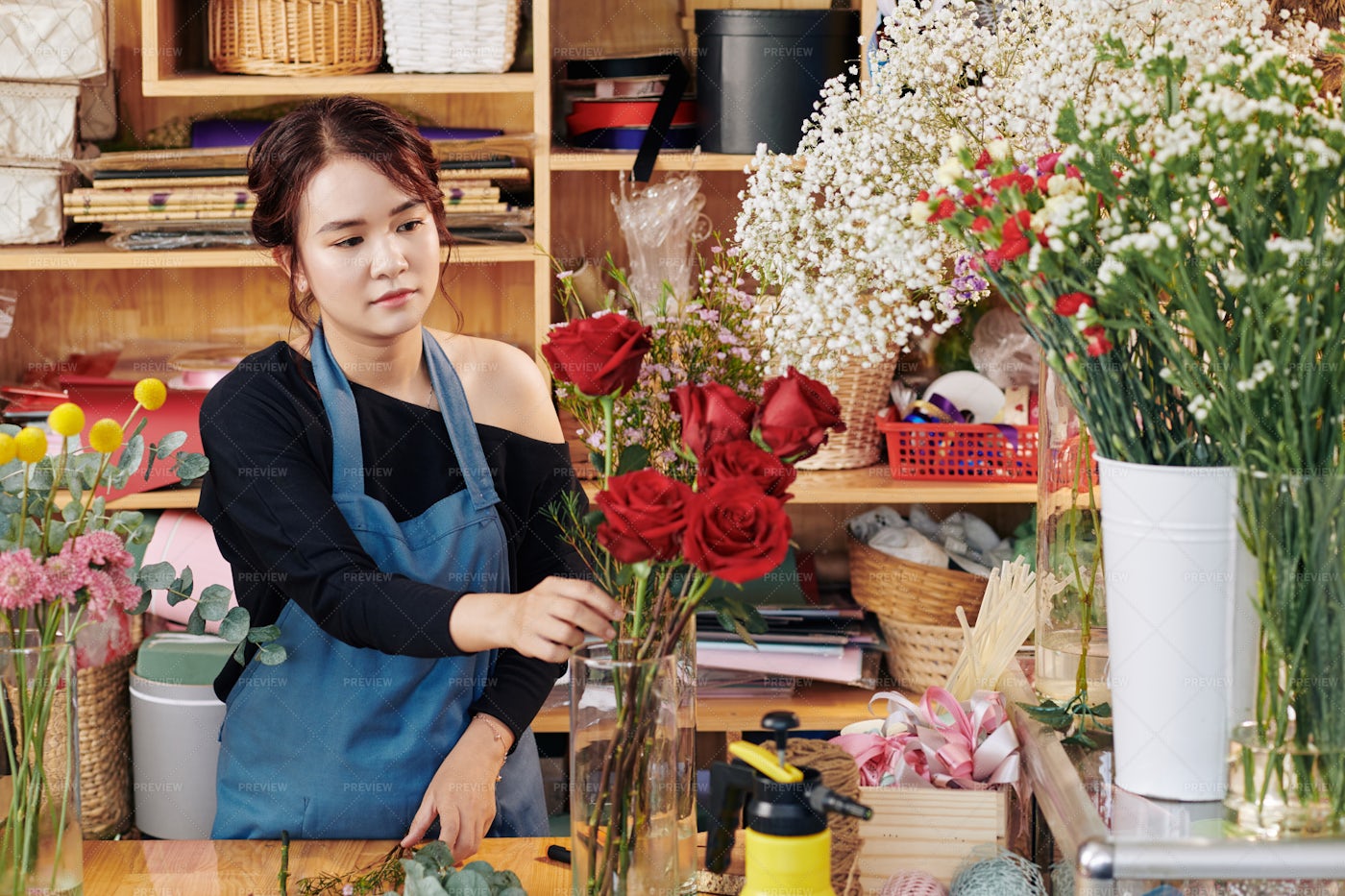 Florist Putting Flowers On Vase: Stock Photos