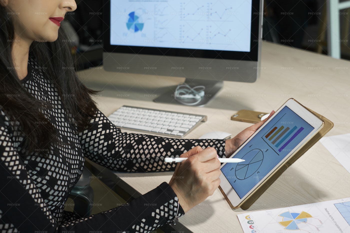Businesswoman Analyzing Financial Chart: Stock Photos