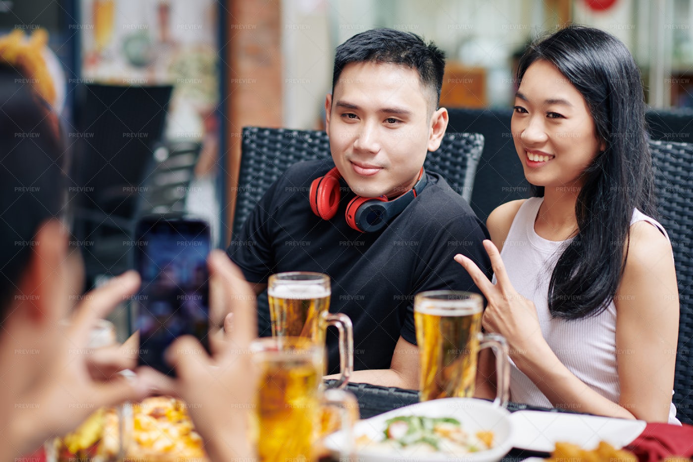 Asian Couple Posing At Camera: Stock Photos