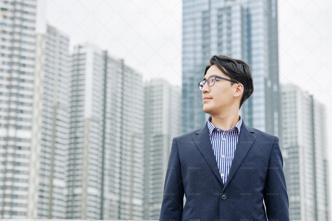 Businessman Looking At New District: Stock Photos
