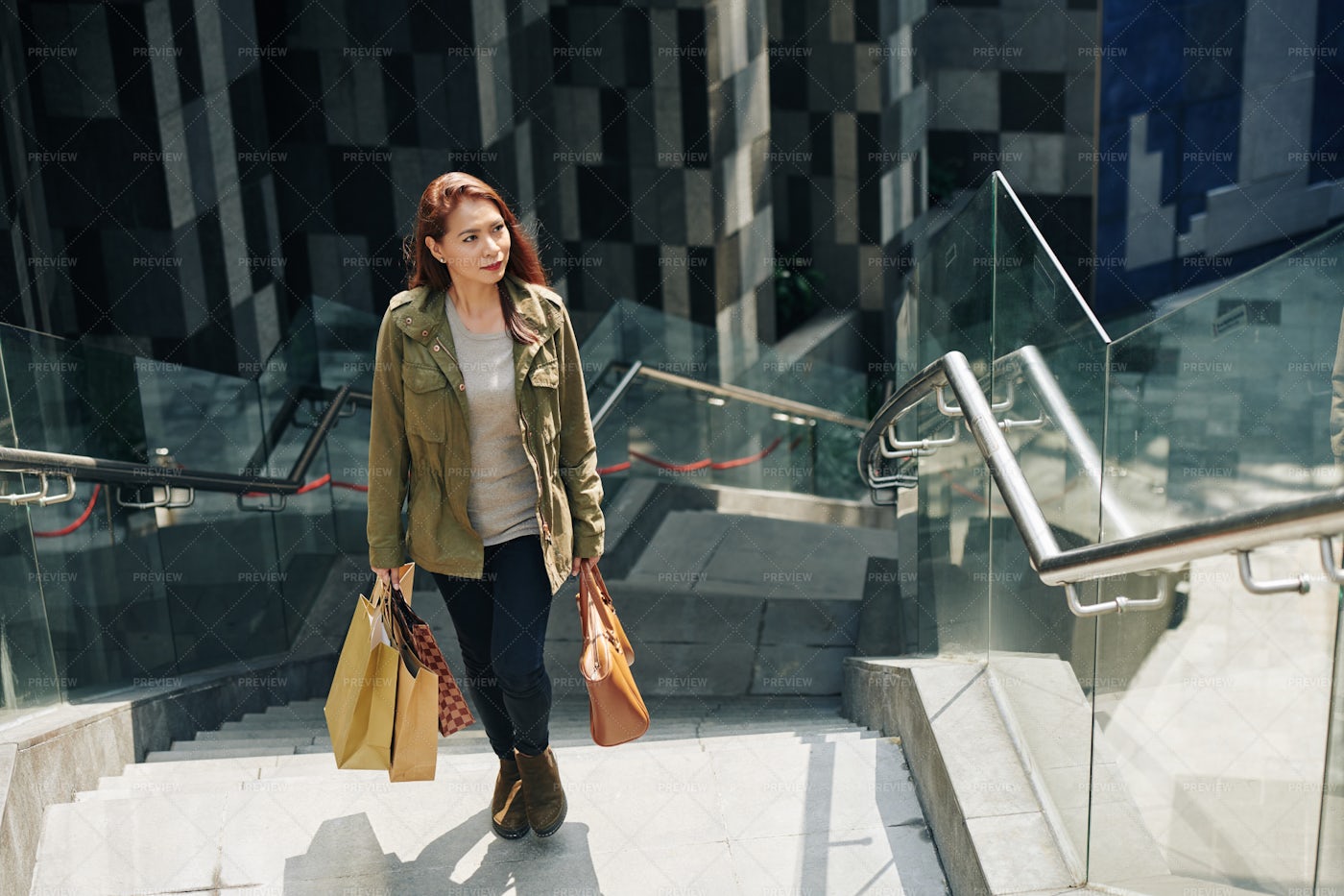 Woman Carrying Shopping Bags: Stock Photos