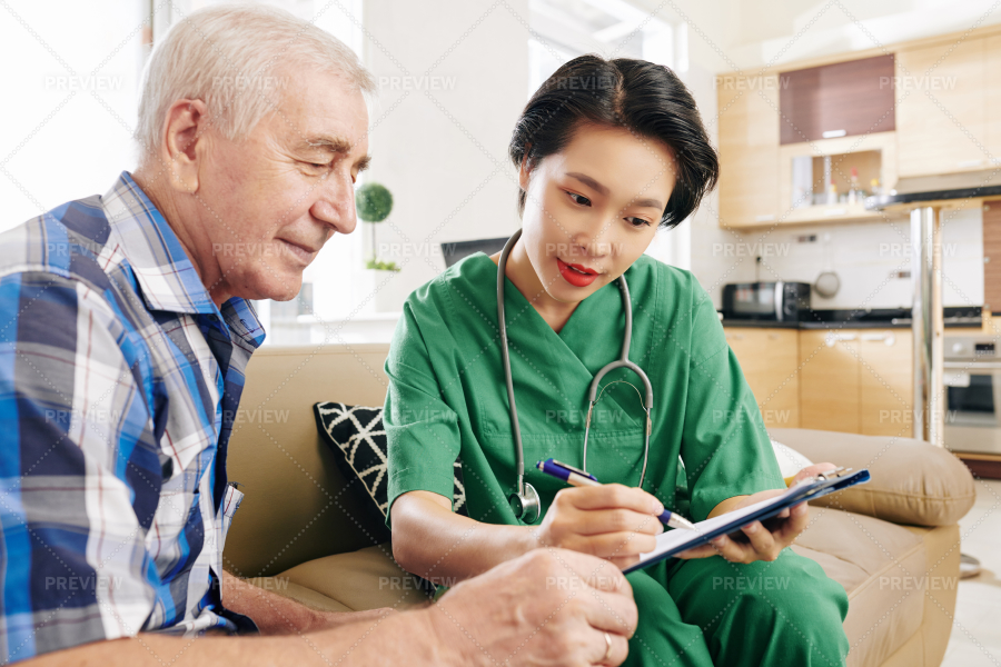 Nurse Explaining Results Of Medical - Stock Photos | Motion Array