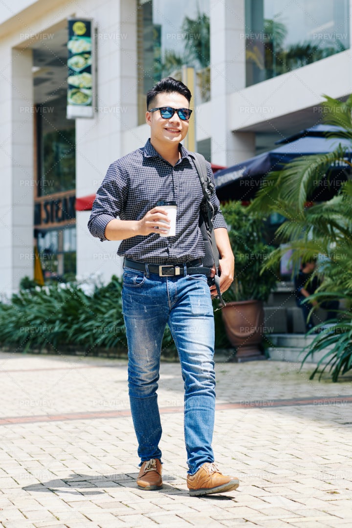 Happy Man Walking In The Street: Stock Photos