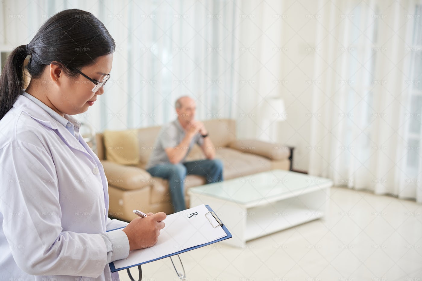 Doctor Writing Prescription: Stock Photos