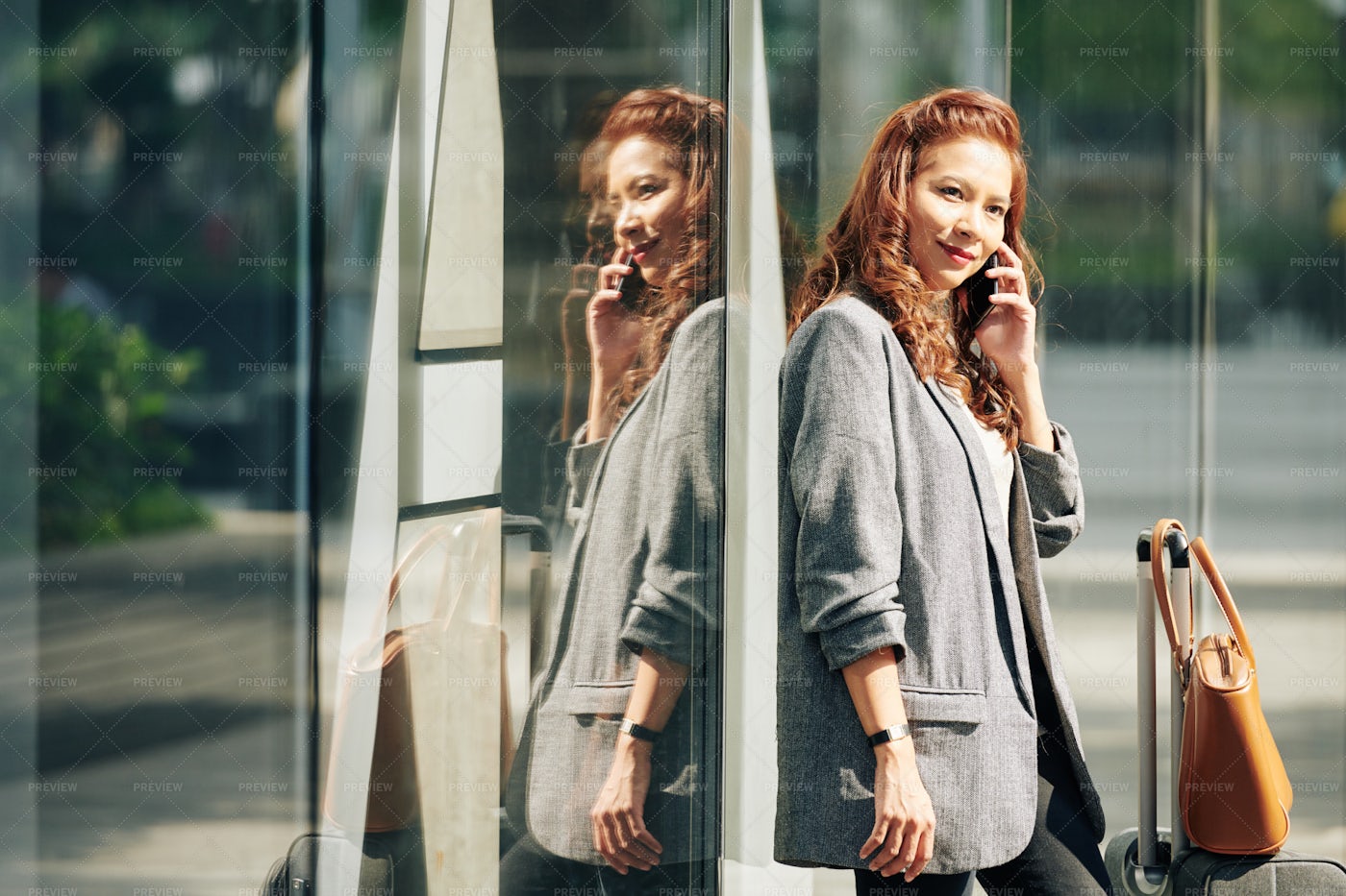 Woman Calling To Taxi Company: Stock Photos