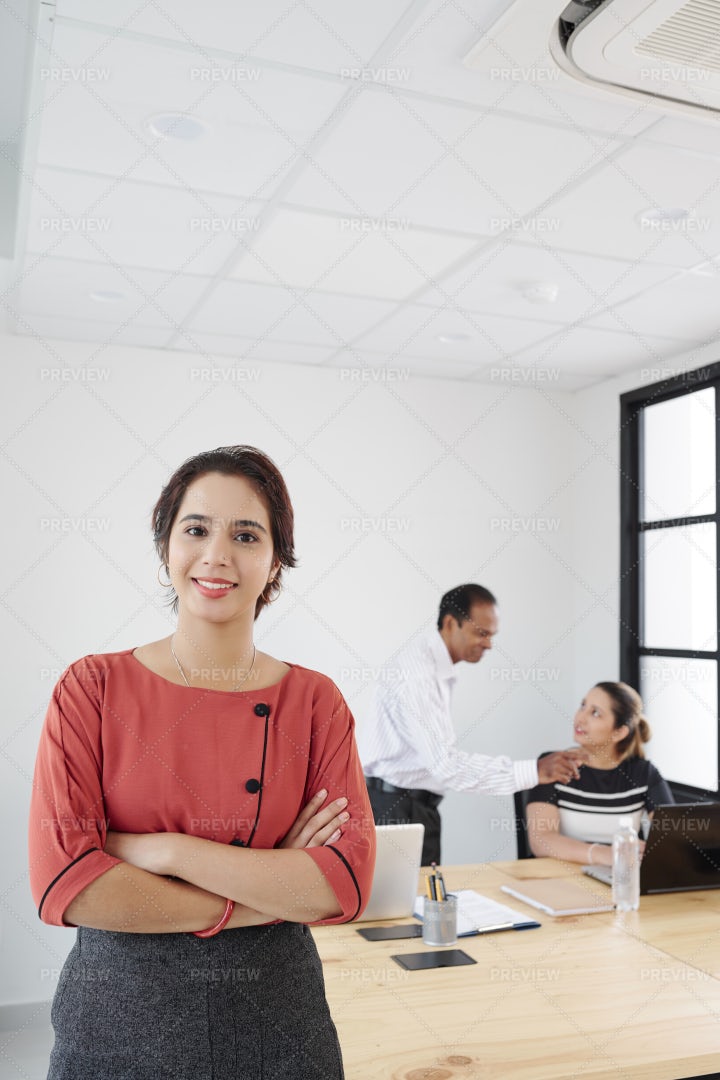 Female Leader Working With Employees: Stock Photos