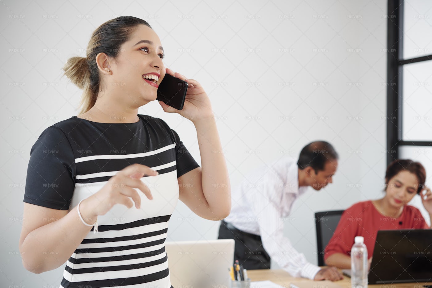 Businesswoman Talking On The Phone At: Stock Photos