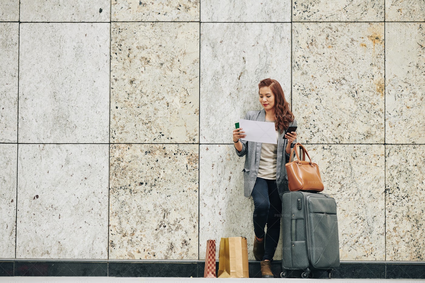 Woman Checking Boarding Pass: Stock Photos
