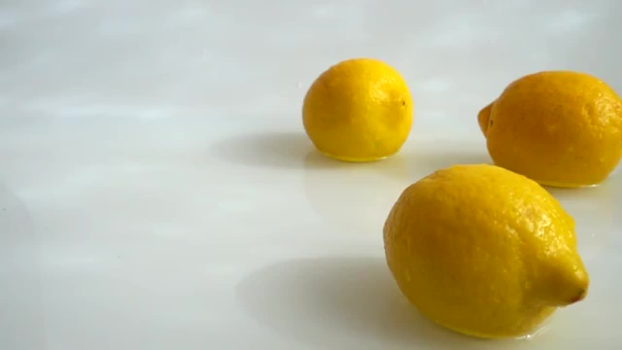 Lemons Falling Into Water - Stock Video | Motion Array