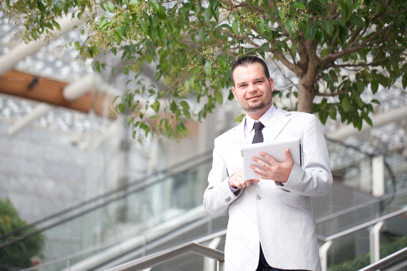 Businessman With Tablet Outside: Stock Photos