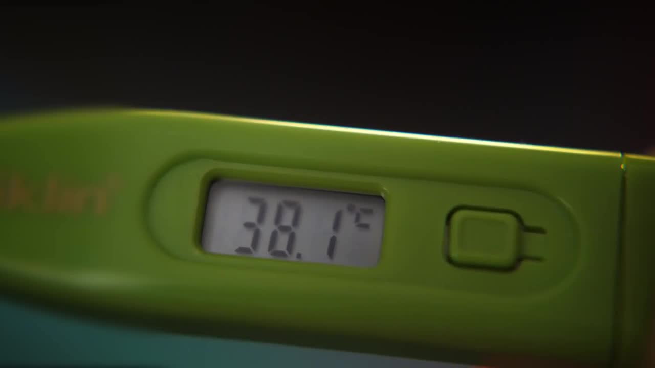 thermometer-showing-fever-close-detail-stock-video-motion-array