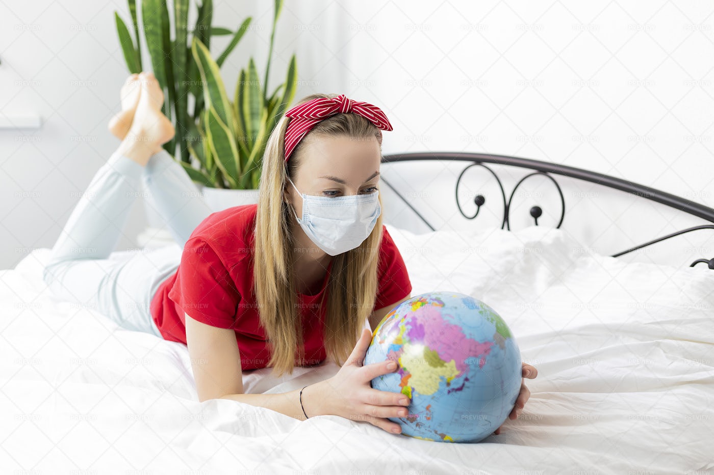Woman Looking At A World Globe: Stock Photos