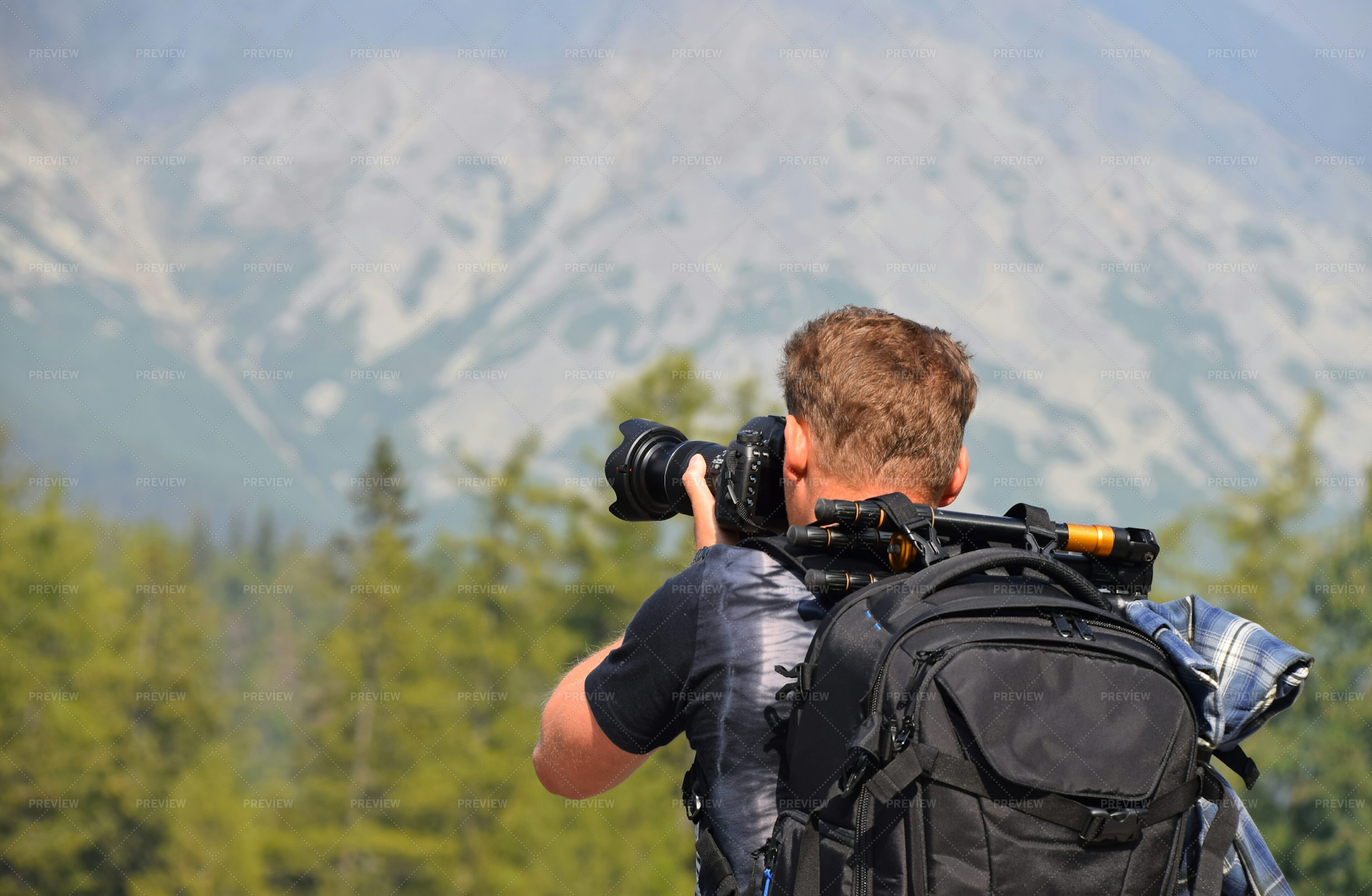 Photographer In Mountains - Stock Photos | Motion Array