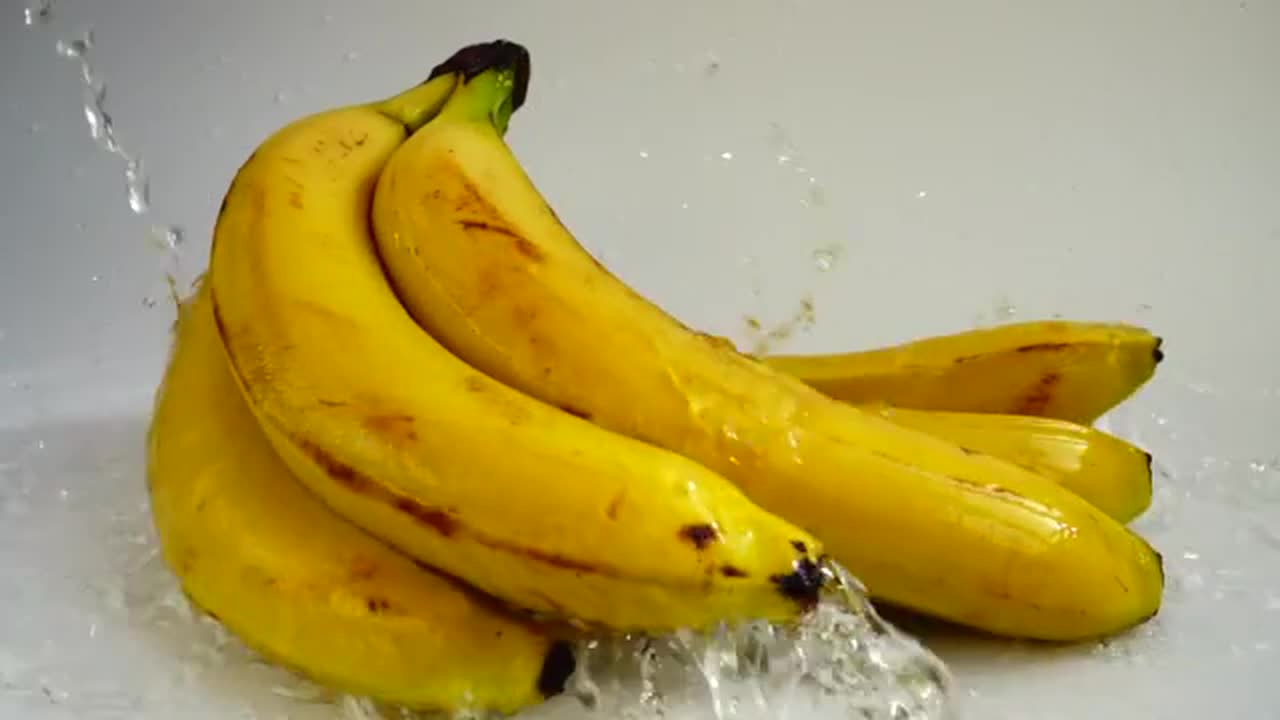 Water Splashes On Bananas - Stock Video | Motion Array