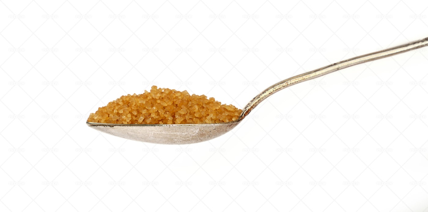 Metal Spoon With Brown Sugar: Stock Photos