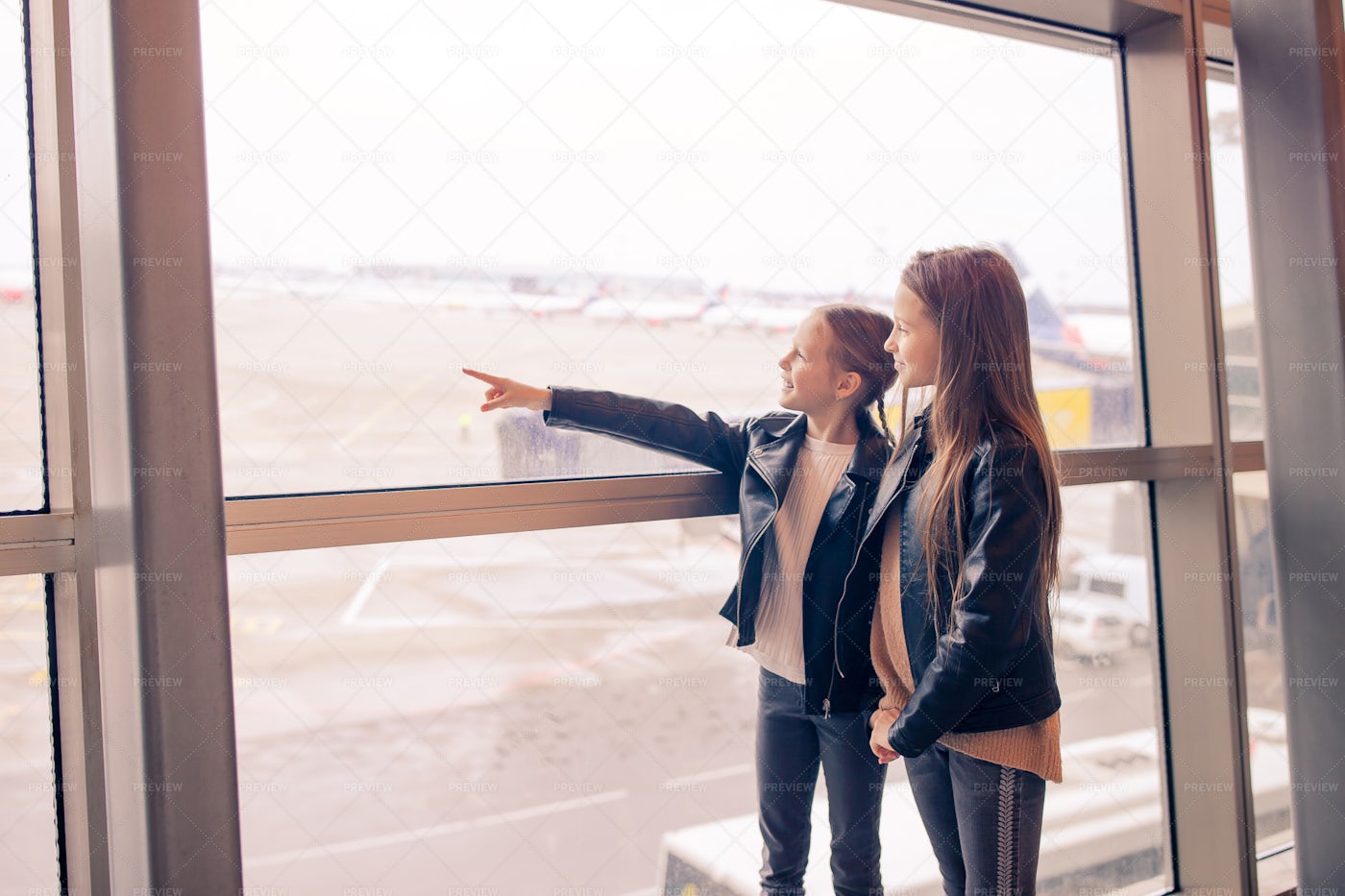 Girls Waiting For Boarding: Stock Photos