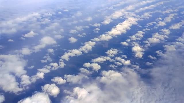 Above Puffy Clouds: Stock Video