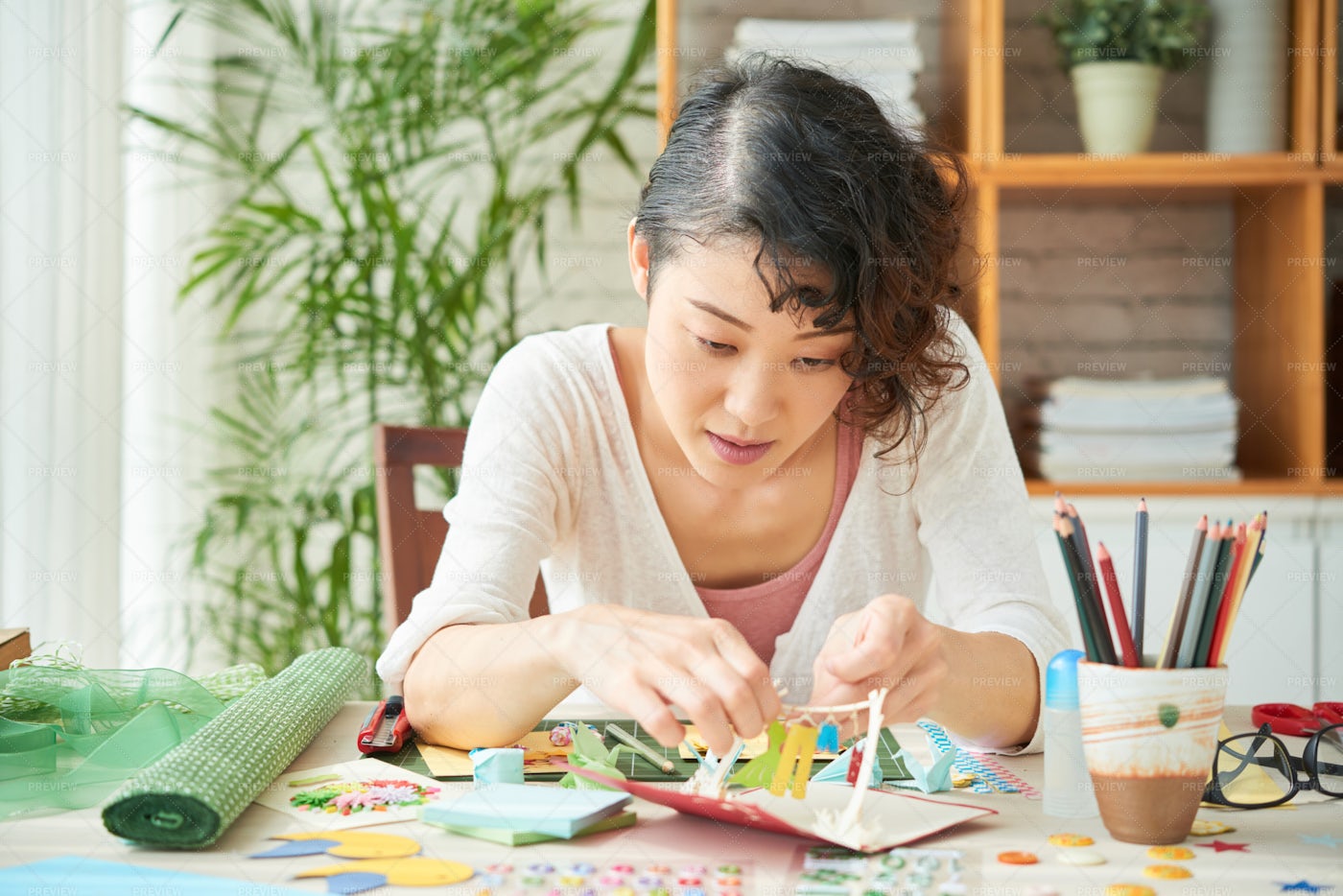 Japanese Woman Focused On...: Stock Photos