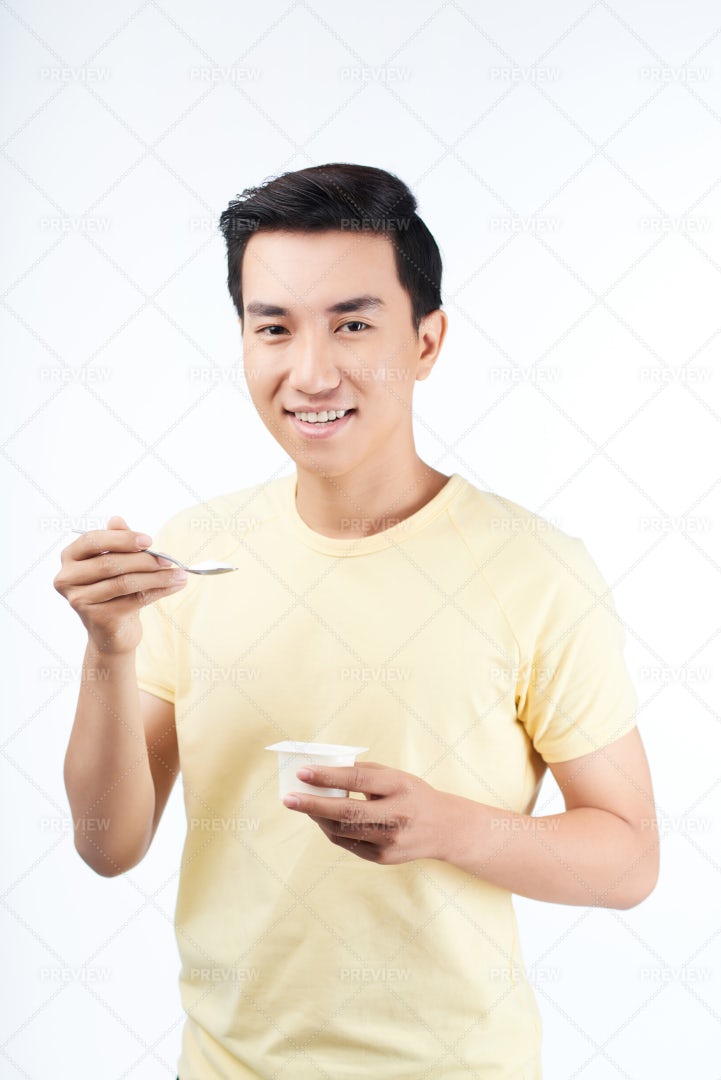 Man Eating Yogurt: Stock Photos