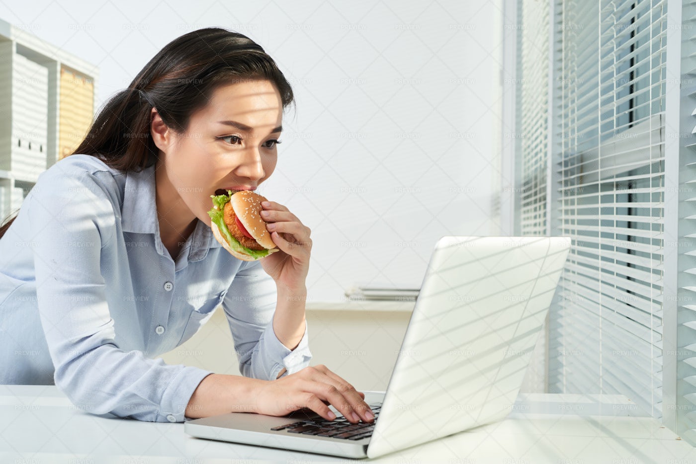 Eating At Work - Stock Photos | Motion Array