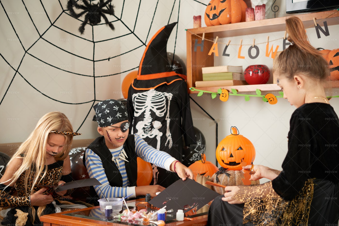 Kids Making Halloween Handicrafts: Stock Photos