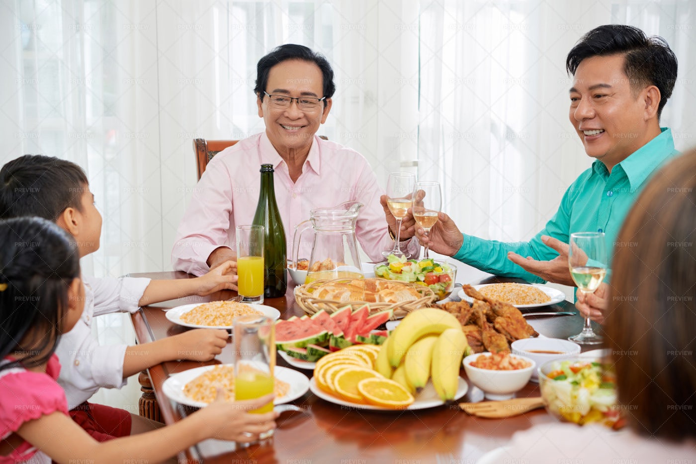 Family Celebrating Dinner: Stock Photos