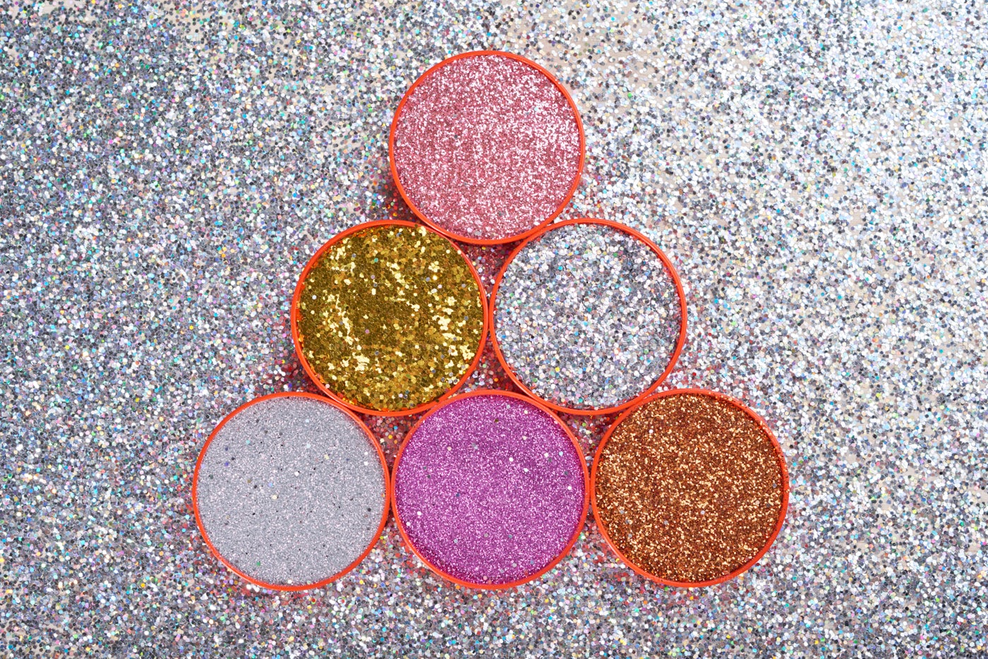 Plastic Lids Filled With Glitters: Stock Photos