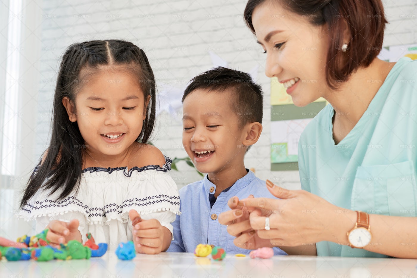 Happy Teacher And Children In Art... - Stock Photos | Motion Array