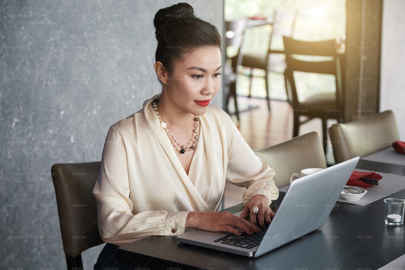 Elegant Asian Female With Laptop At...: Stock Photos