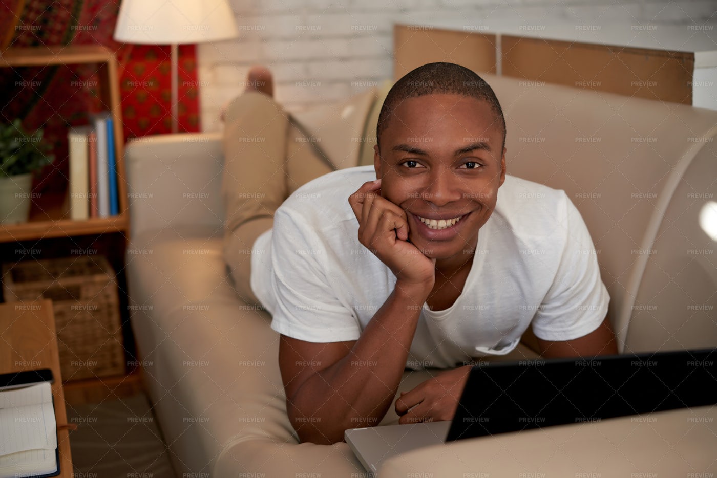 Man Resting On Sofa: Stock Photos