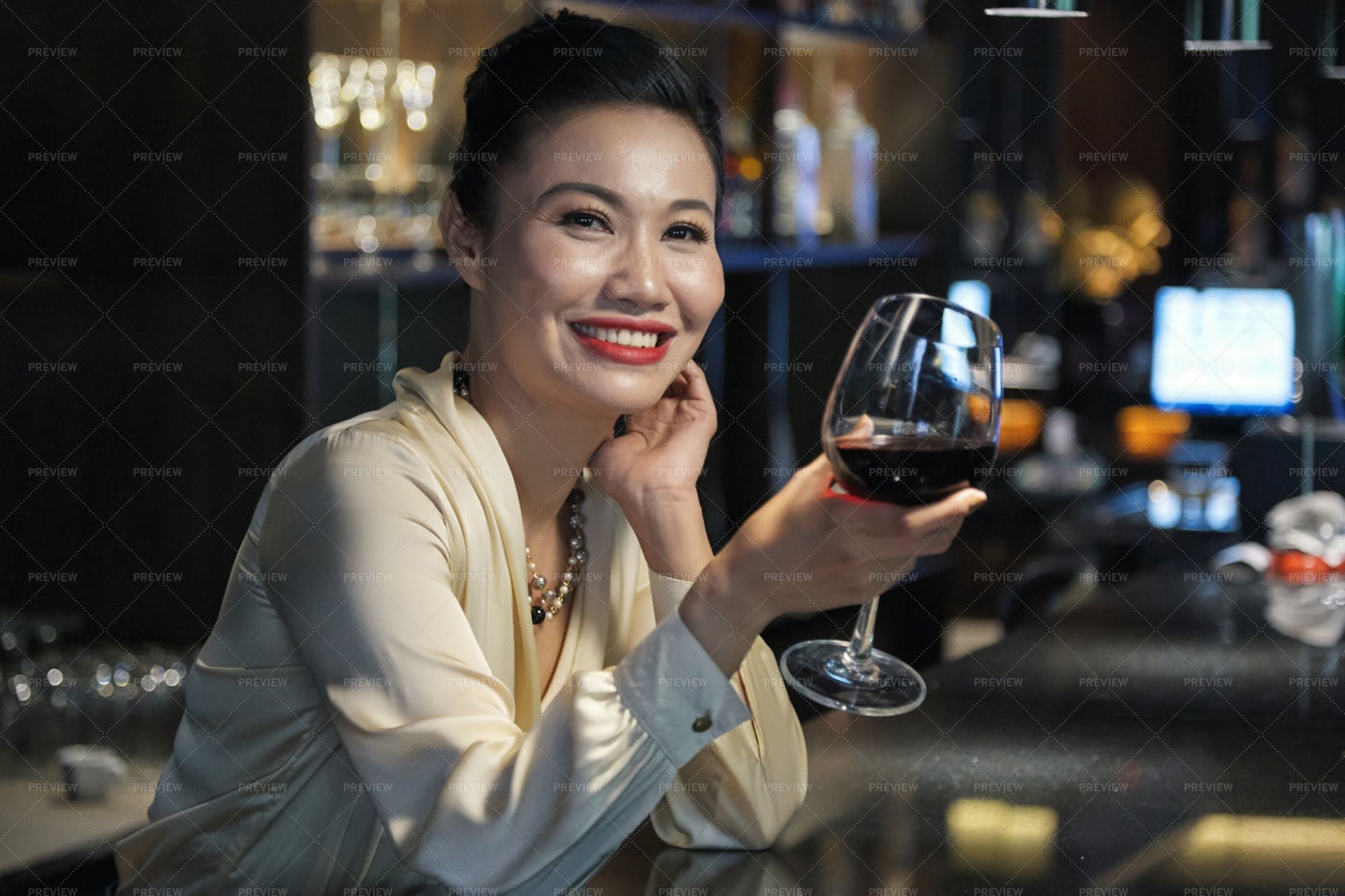 Smiling Elegant Asian Female With...: Stock Photos