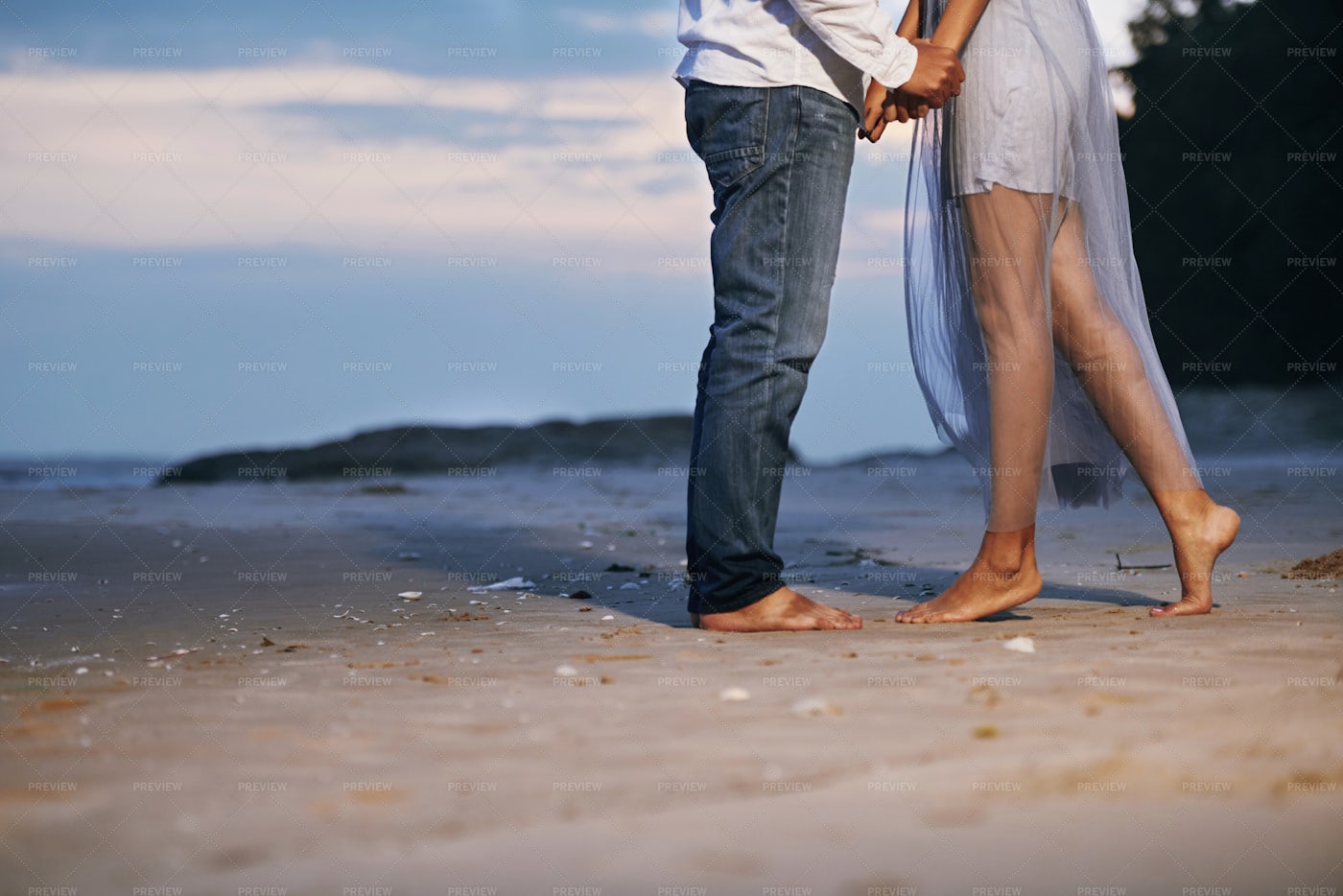 Couple In Love Standing On Beach: Stock Photos