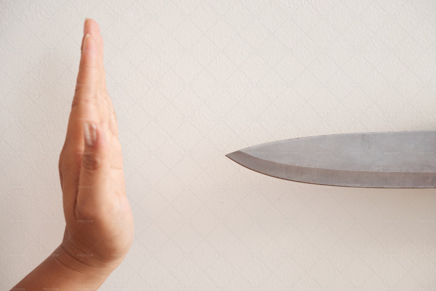 Crop Hand Stopping Knife: Stock Photos